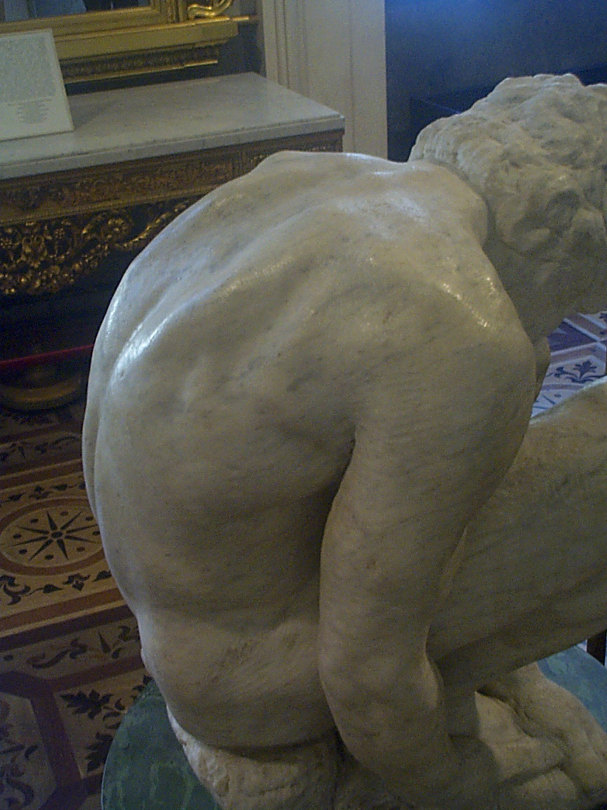 Michelangelo-Crouching_Boy_100de